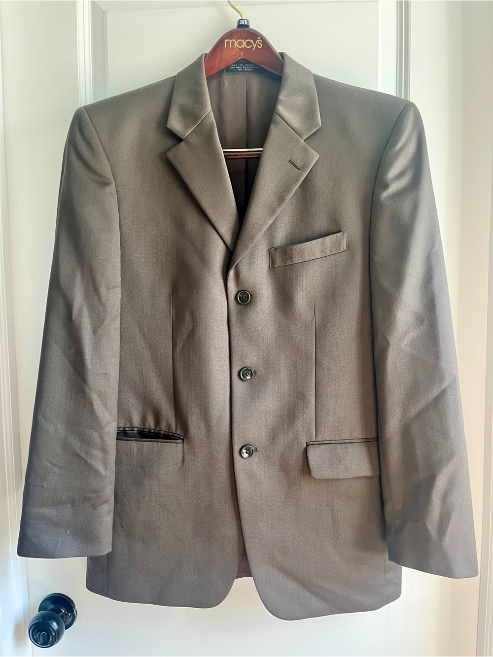 Jones New York Men's Brown Three-Button Blazer and pleated pants.